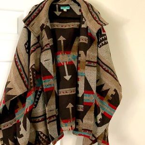 Medium Aztec print poncho. 3 quarter sleeve